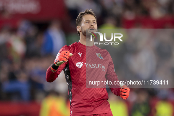 Alex Remiro of Real Sociedad celebrates a goal during the La Liga EA Sports match between Sevilla FC and Real Sociedad at Sanchez Pizjuan in...