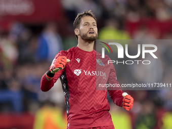 Alex Remiro of Real Sociedad celebrates a goal during the La Liga EA Sports match between Sevilla FC and Real Sociedad at Sanchez Pizjuan in...