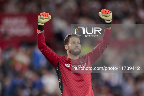 Alex Remiro of Real Sociedad celebrates a goal during the La Liga EA Sports match between Sevilla FC and Real Sociedad at Sanchez Pizjuan in...