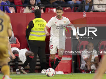 Jesus Navas of Sevilla FC runs with the ball during the La Liga EA Sports match between Sevilla FC and Real Sociedad at Sanchez Pizjuan in S...