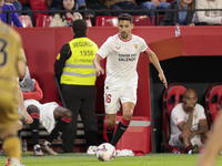 Jesus Navas of Sevilla FC runs with the ball during the La Liga EA Sports match between Sevilla FC and Real Sociedad at Sanchez Pizjuan in S...