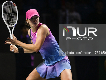 RIYADH, SAUDI ARABIA - NOVEMBER 03: Iga Swiatek of Poland during her match against Barbora Krejcikovas of Czech Republic on day 2 of the 202...