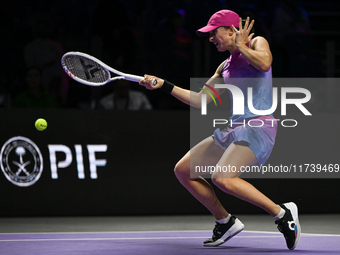 RIYADH, SAUDI ARABIA - NOVEMBER 03: Iga Swiatek of Poland during her match against Barbora Krejcikovas of Czech Republic on day 2 of the 202...