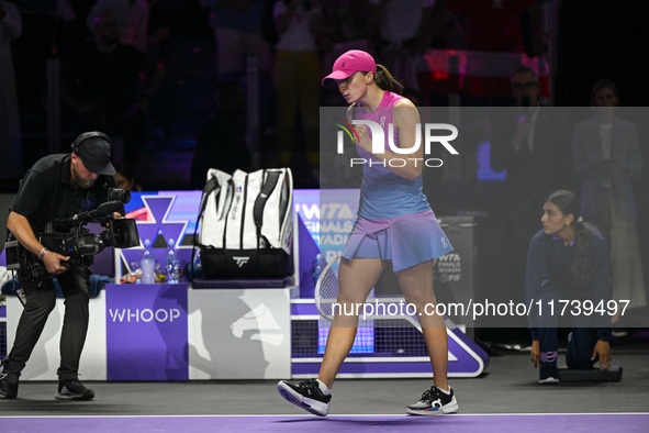 RIYADH, SAUDI ARABIA - NOVEMBER 03: Iga Swiatek of Poland celebrates after winning her opening match against Barbora Krejcikova of the Czech...