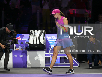 RIYADH, SAUDI ARABIA - NOVEMBER 03: Iga Swiatek of Poland celebrates after winning her opening match against Barbora Krejcikova of the Czech...