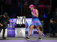 RIYADH, SAUDI ARABIA - NOVEMBER 03: Iga Swiatek of Poland celebrates after winning her opening match against Barbora Krejcikova of the Czech...