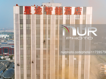 A firefighting and rescue drill for a large commercial complex takes place in Yinchuan, China, on November 1, 2024. (