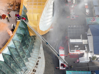 A firefighting and rescue drill for a large commercial complex takes place in Yinchuan, China, on November 1, 2024. (