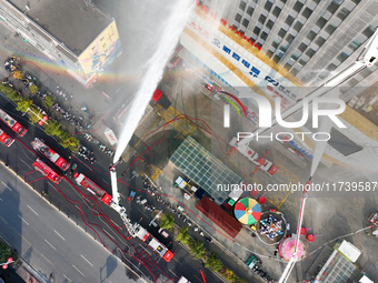 A firefighting and rescue drill for a large commercial complex takes place in Yinchuan, China, on November 1, 2024. (