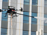 A firefighting and rescue drill for a large commercial complex takes place in Yinchuan, China, on November 1, 2024. (