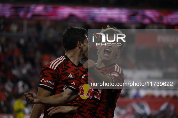 Dante Vainzer celebrates with teammates after scoring a goal at Red Bull Stadium in Harris, New Jersey, on November 3, 2024, where they tie...