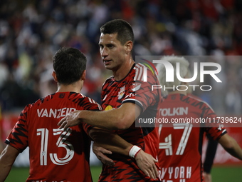 Dante Vainzer celebrates with teammates after scoring a goal at Red Bull Stadium in Harris, New Jersey, on November 3, 2024, where they tie...