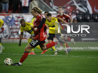 Emil Forsberg scores the penalty kick and celebrates with teammates at Red Bull Stadium in Harris, New Jersey, on November 3, 2024, where th...