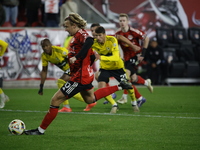 Emil Forsberg scores the penalty kick and celebrates with teammates at Red Bull Stadium in Harris, New Jersey, on November 3, 2024, where th...