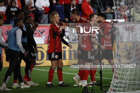 Emil Forsberg scores the penalty kick and celebrates with teammates at Red Bull Stadium in Harris, New Jersey, on November 3, 2024, where th...