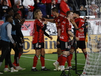 Emil Forsberg scores the penalty kick and celebrates with teammates at Red Bull Stadium in Harris, New Jersey, on November 3, 2024, where th...