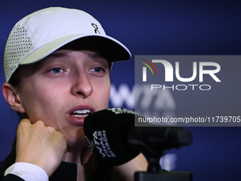 RIYADH, SAUDI ARABIA - NOVEMBER 03: Iga Swiatek of Poland speaks to the media at the post-match press conference after her first tournament...