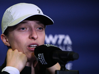 RIYADH, SAUDI ARABIA - NOVEMBER 03: Iga Swiatek of Poland speaks to the media at the post-match press conference after her first tournament...