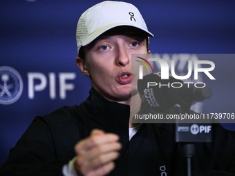 RIYADH, SAUDI ARABIA - NOVEMBER 03: Iga Swiatek of Poland speaks to the media at the post-match press conference after her first tournament...