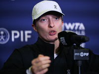 RIYADH, SAUDI ARABIA - NOVEMBER 03: Iga Swiatek of Poland speaks to the media at the post-match press conference after her first tournament...