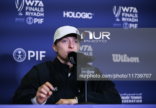 RIYADH, SAUDI ARABIA - NOVEMBER 03: Iga Swiatek of Poland speaks to the media at the post-match press conference after her first tournament...