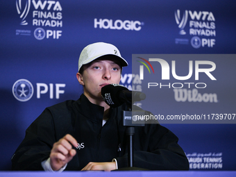 RIYADH, SAUDI ARABIA - NOVEMBER 03: Iga Swiatek of Poland speaks to the media at the post-match press conference after her first tournament...