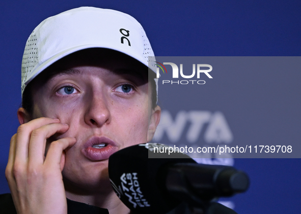 RIYADH, SAUDI ARABIA - NOVEMBER 03: Iga Swiatek of Poland speaks to the media at the post-match press conference after her first tournament...