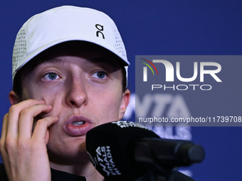 RIYADH, SAUDI ARABIA - NOVEMBER 03: Iga Swiatek of Poland speaks to the media at the post-match press conference after her first tournament...