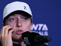 RIYADH, SAUDI ARABIA - NOVEMBER 03: Iga Swiatek of Poland speaks to the media at the post-match press conference after her first tournament...