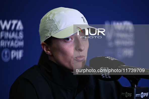 RIYADH, SAUDI ARABIA - NOVEMBER 03: Iga Swiatek of Poland speaks to the media at the post-match press conference after her first tournament...