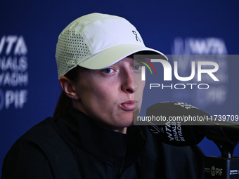 RIYADH, SAUDI ARABIA - NOVEMBER 03: Iga Swiatek of Poland speaks to the media at the post-match press conference after her first tournament...