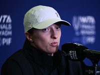 RIYADH, SAUDI ARABIA - NOVEMBER 03: Iga Swiatek of Poland speaks to the media at the post-match press conference after her first tournament...