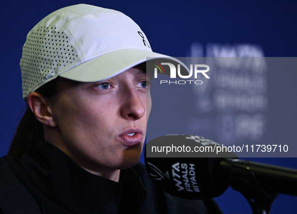 RIYADH, SAUDI ARABIA - NOVEMBER 03: Iga Swiatek of Poland speaks to the media at the post-match press conference after her first tournament...