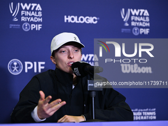 RIYADH, SAUDI ARABIA - NOVEMBER 03: Iga Swiatek of Poland speaks to the media at the post-match press conference after her first tournament...