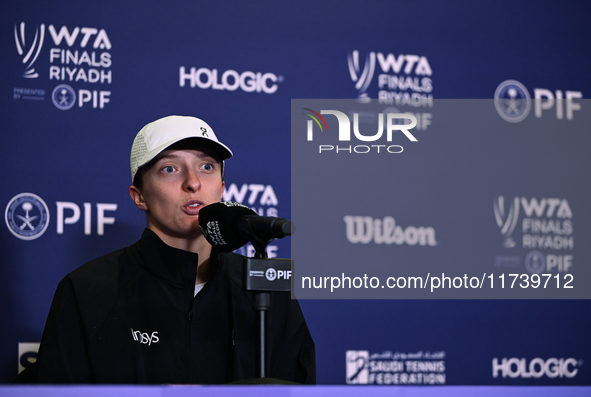 RIYADH, SAUDI ARABIA - NOVEMBER 03: Iga Swiatek of Poland speaks to the media at the post-match press conference after her first tournament...