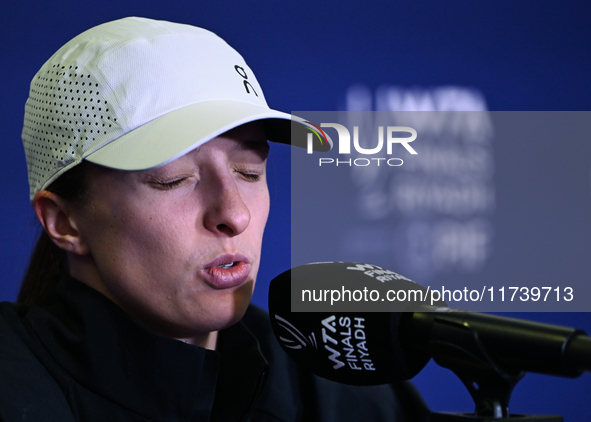 RIYADH, SAUDI ARABIA - NOVEMBER 03: Iga Swiatek of Poland speaks to the media at the post-match press conference after her first tournament...