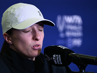 RIYADH, SAUDI ARABIA - NOVEMBER 03: Iga Swiatek of Poland speaks to the media at the post-match press conference after her first tournament...