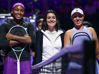 RIYADH, SAUDI ARABIA - NOVEMBER 03: Coco Gauff (L) and Jessica Pegula (R) pose for a photo with Ons Jabeur ahead of their opening match on d...