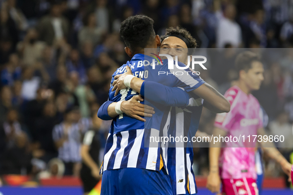 Galeno celebrates after scoring a goal for FC Porto during the Portuguese Primeira Liga soccer match against Estoril at Estadio do Dragao in...