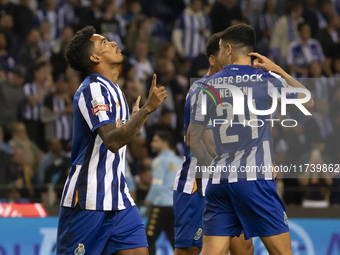 Galeno celebrates after scoring a goal for FC Porto during the Portuguese Primeira Liga soccer match against Estoril at Estadio do Dragao in...