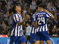 Galeno celebrates after scoring a goal for FC Porto during the Portuguese Primeira Liga soccer match against Estoril at Estadio do Dragao in...