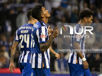 Galeno celebrates after scoring a goal for FC Porto during the Portuguese Primeira Liga soccer match against Estoril at Estadio do Dragao in...