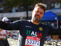 Alan Clusaz of Italy poses for a photo at mile 16 as he heads up First Avenue during the 2024 New York City Marathon in New York, N.Y., on N...