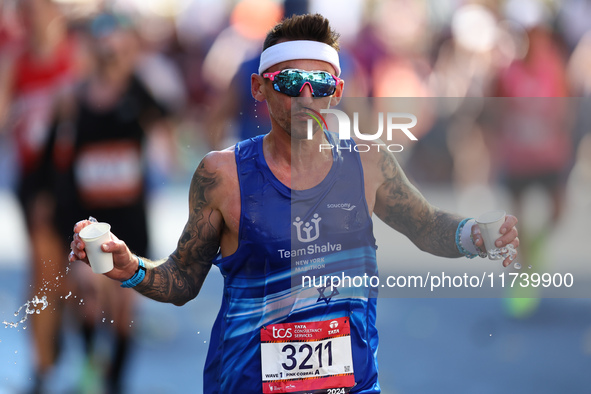 Runner Artun Zehavi of Ireland heads up First Avenue during the New York City Marathon in New York, N.Y., on November 3, 2024. 