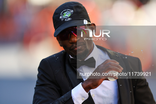 Hakeem Olajuwan Adewale of Germany heads up First Avenue in a suit during the 2024 New York City Marathon in New York, N.Y., on November 3,...