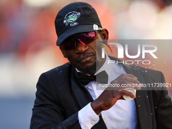 Hakeem Olajuwan Adewale of Germany heads up First Avenue in a suit during the 2024 New York City Marathon in New York, N.Y., on November 3,...