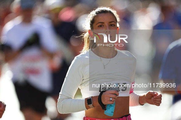 Runner Meredith Shank of the United States heads up First Avenue during the New York City Marathon in New York, N.Y., on November 3, 2024. 