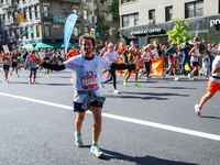 Runners trudge up First Avenue at Mile 16 of the New York City Marathon in New York City, United States, on November 3, 2024. (