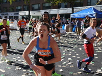 Runners trudge up First Avenue at Mile 16 of the New York City Marathon in New York City, United States, on November 3, 2024. (