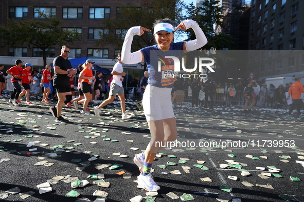 Runners trudge up First Avenue at Mile 16 of the New York City Marathon in New York City, United States, on November 3, 2024. 